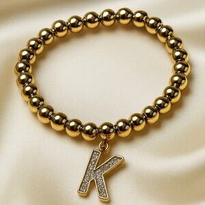 Gold Beaded Stretch Bracelet w/ Colorful Dazzling "K" Charm – Fashion Jewelry
